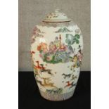A Chinese famille Rose porcelain vase and cover decorated with Chinese gods and deer in the