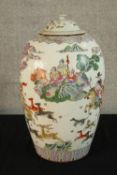A Chinese famille Rose porcelain vase and cover decorated with Chinese gods and deer in the
