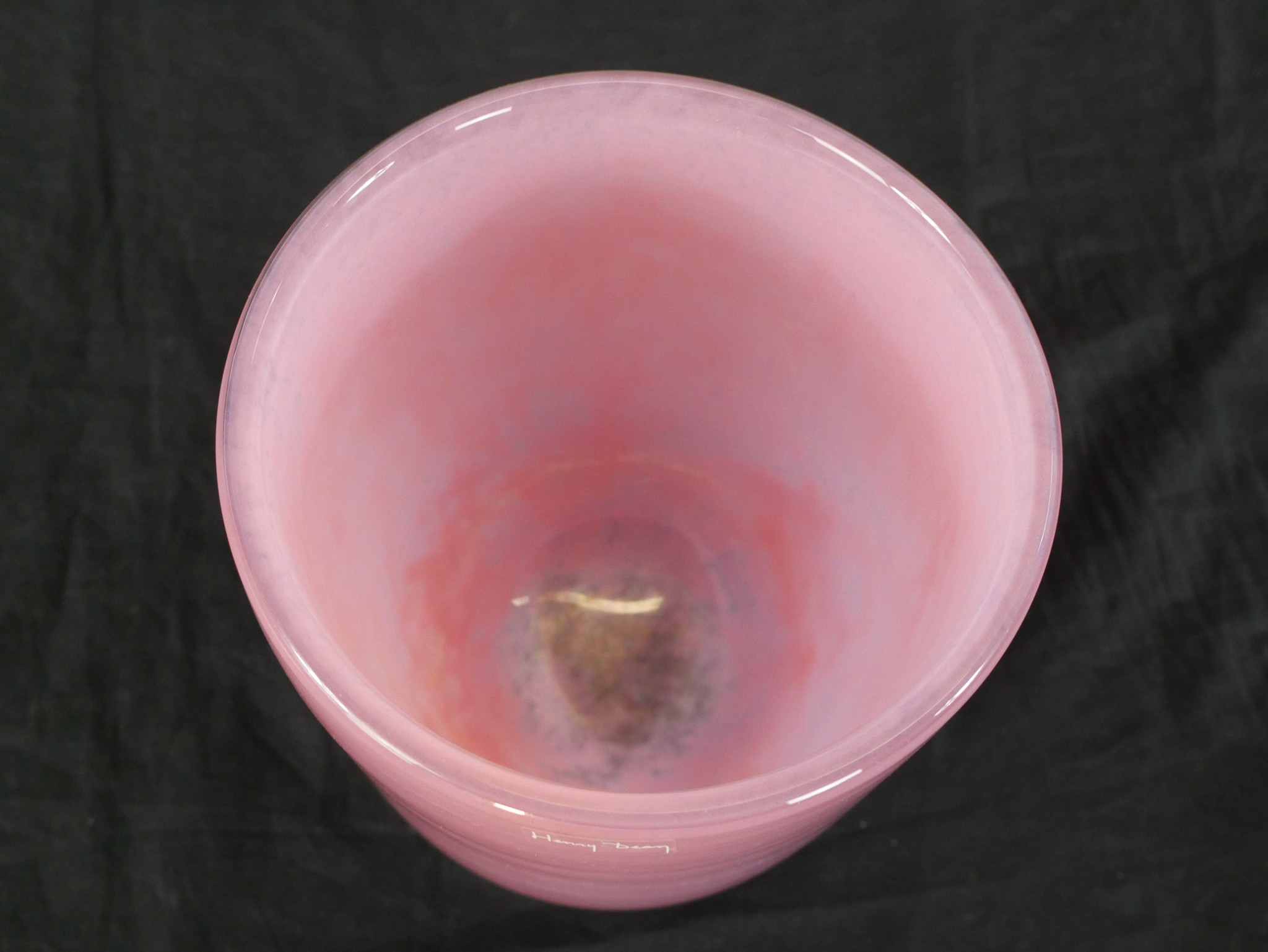 A large studio glass vase by Henry Dean, of cylindrical form in pink, signed to the base. H.19 W. - Image 2 of 4