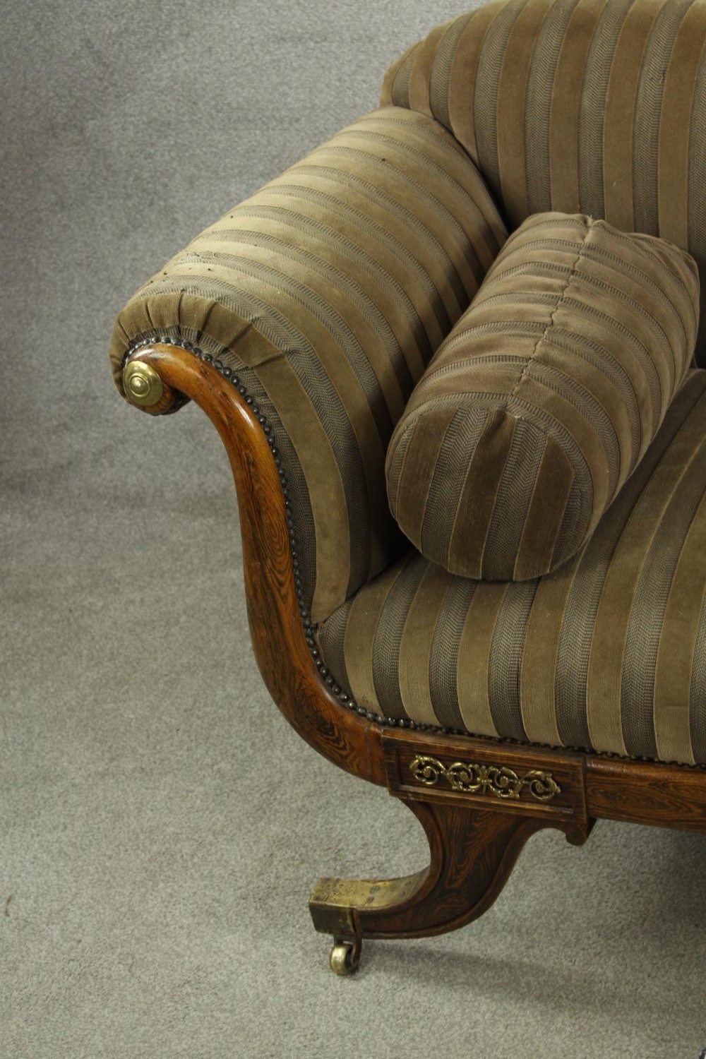 A Regency rosewood framed scroll arm settee upholstered in brown fabric, raised on four outswept - Image 4 of 10