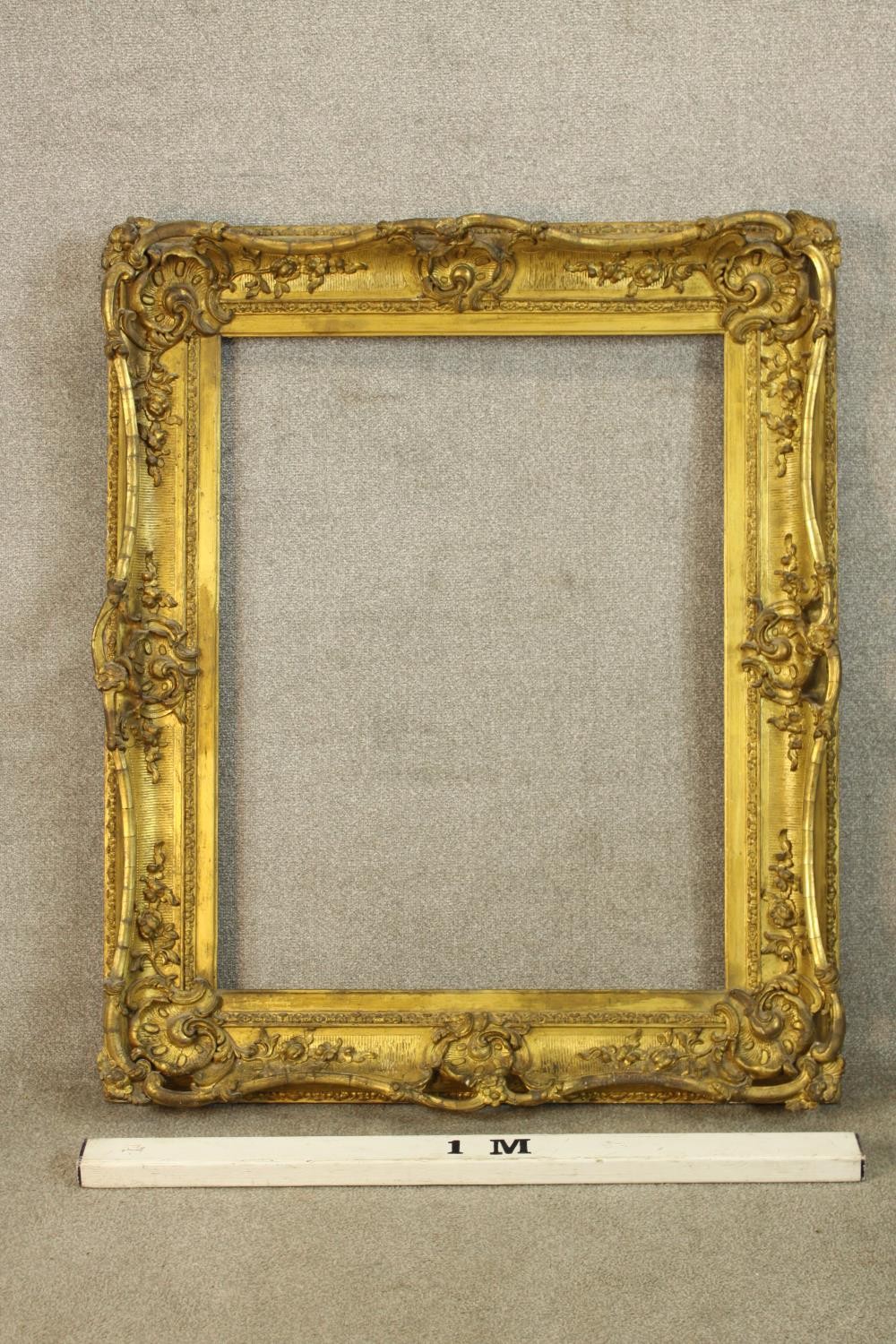 A 19th/ early 20th century Rococo style rectangular gilt frame. H.120 W.100cm. - Image 2 of 3