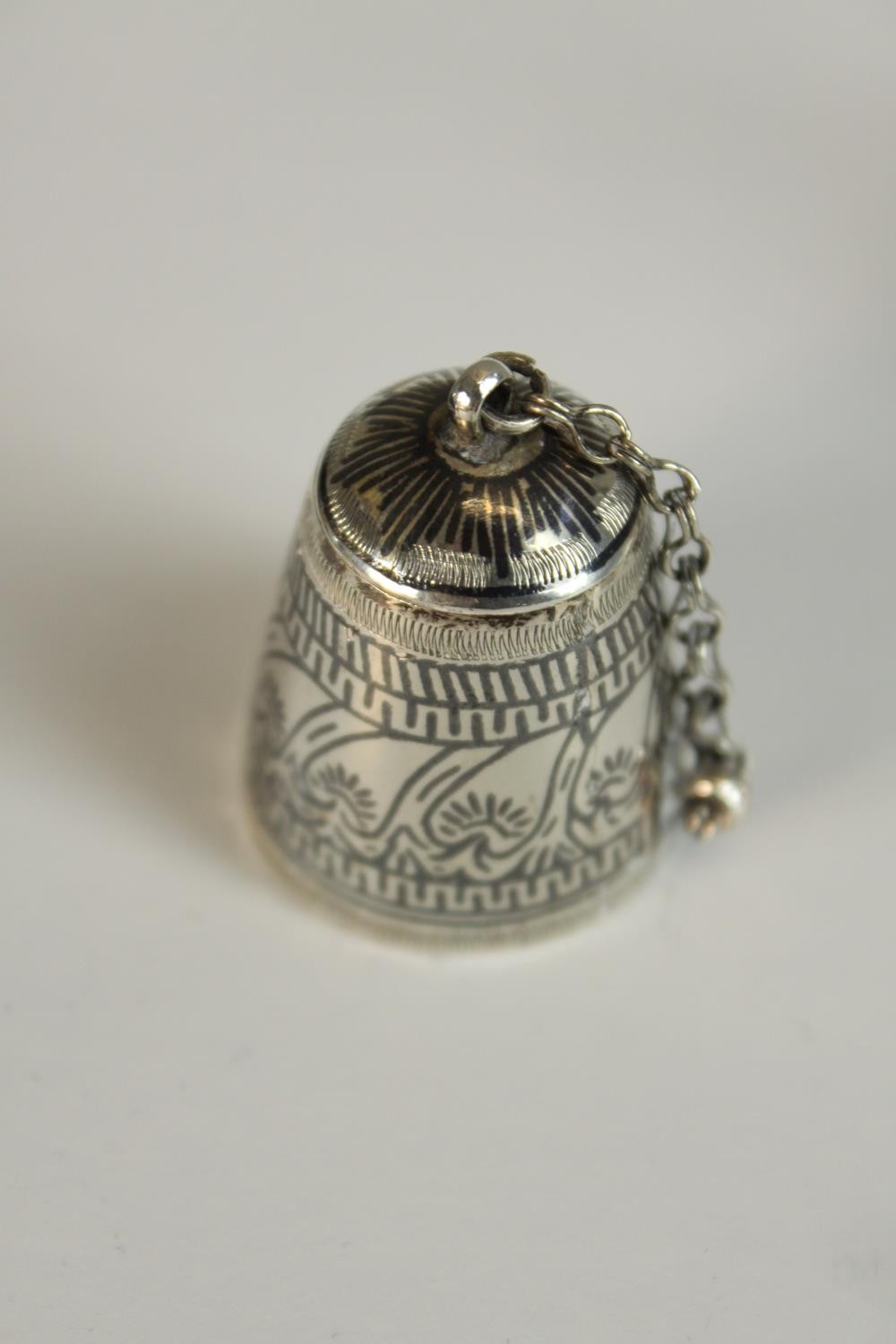 Three pieces of Northern Iraqi silver to include two Kohl jars, one with niello work and a white - Image 4 of 12
