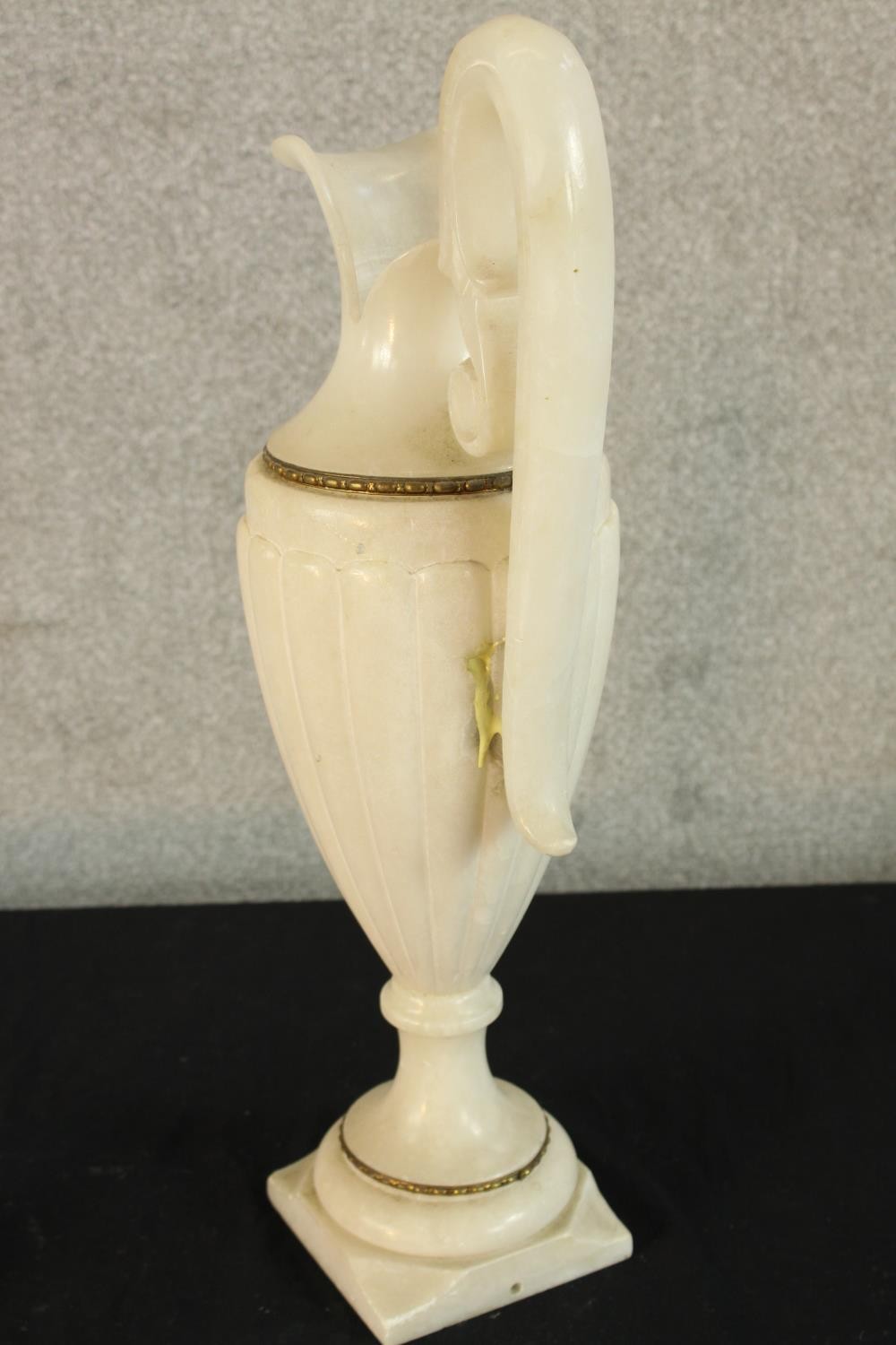 A large 19th/early 20th century carved alabaster ewer, with 'C' scroll handle raised on turned socle - Image 5 of 5