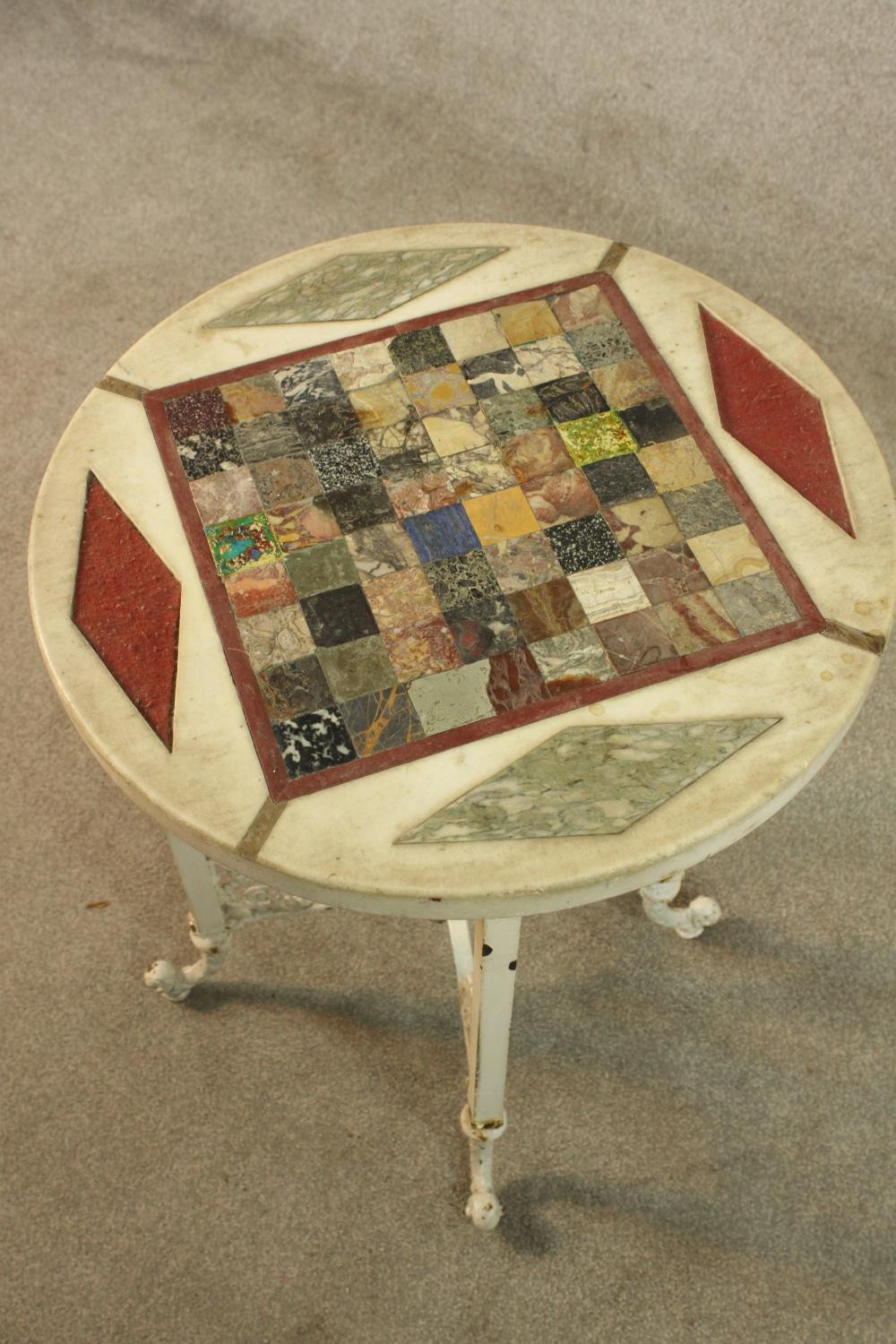 A 19th century specimen marble and hardstone set circular table raised on four painted cast iron - Image 3 of 3