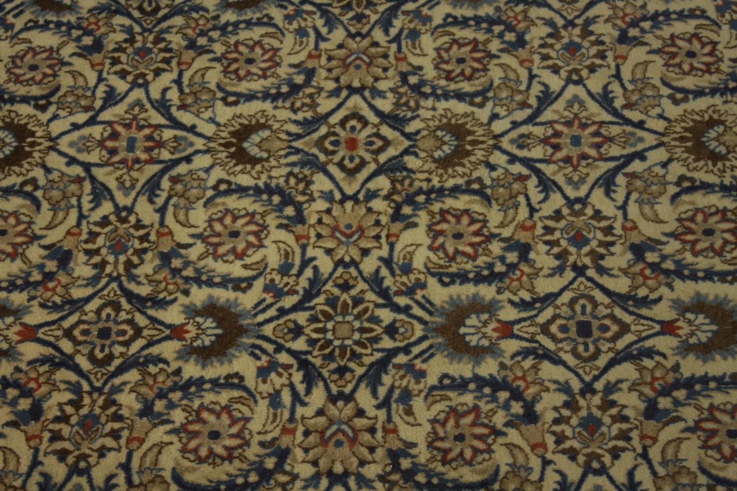 An 20th century Persian woollen carpet with all over floral and scroll decoration. L.203 W.194cm. - Image 3 of 5
