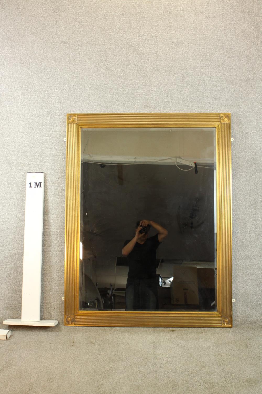 A contemporary 20th century guilded rectangular wall mirror with reeded decoration. H.140 W.110cm. - Image 2 of 7