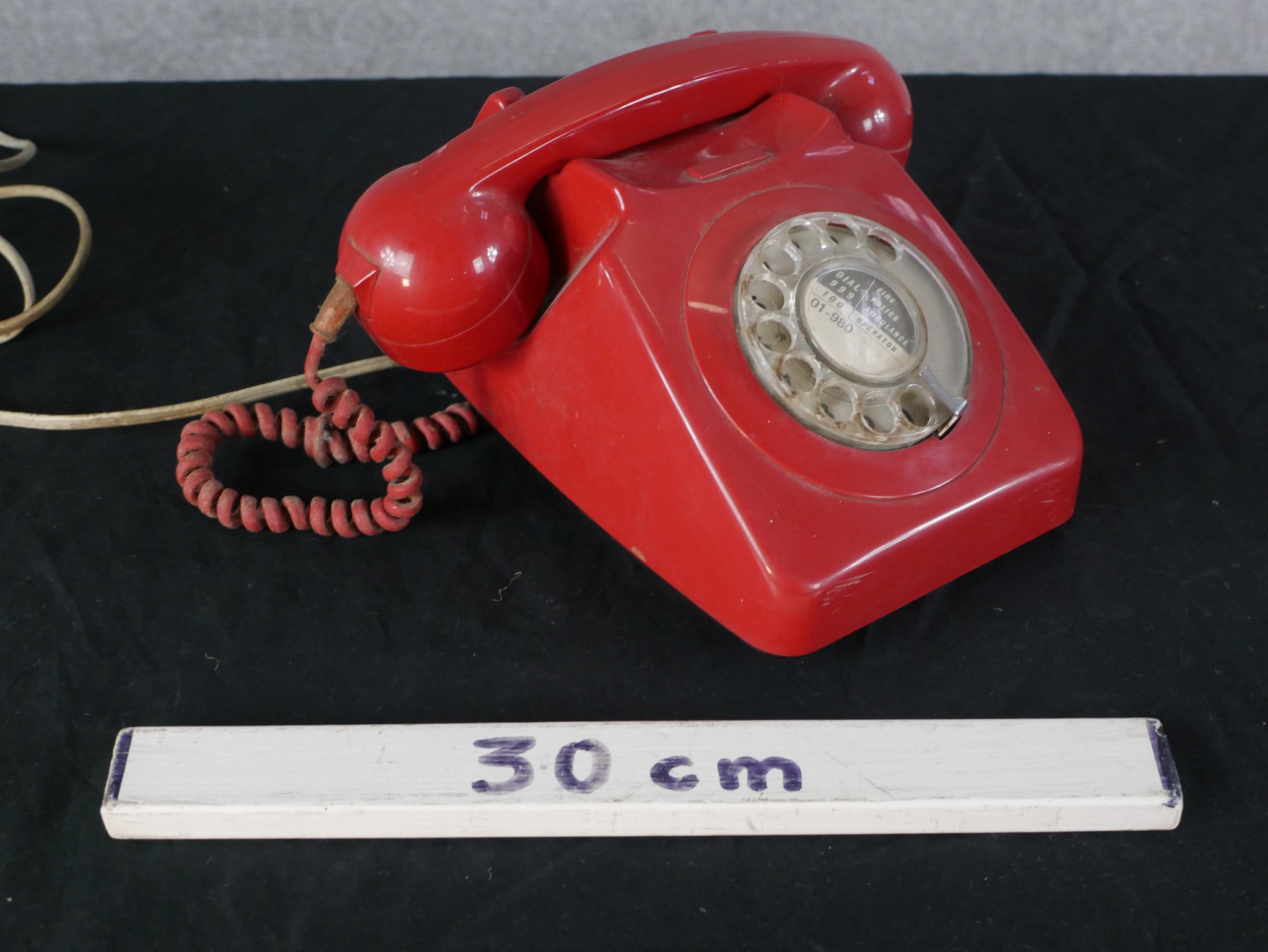 A 20th century red Bakelite electric telephone dial with wind up dial. H.15 W.25 D.22cm - Image 2 of 2