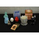 Various Chanel and other glass novelty scent bottles together with an Avon candle holder. H.16cm. (