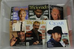 A quantity of Cigar Officionado magazines. H.30 W.23cm. (each)