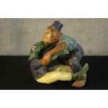 A 20th century painted Studio pottery figure of a frog and a monkey. H.34cm.
