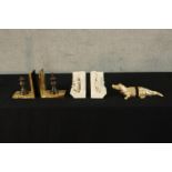 Three pairs of 20th century bookends to include bookends a king and queen chess piece mounted on