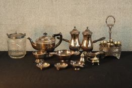 A pair of early 20th century silver plated hot chocolate pots, each with ebonised turned wooden