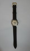A mid 20th century Zenith gentlemens wristwatch with baton numerals and sweeping second hand dial on