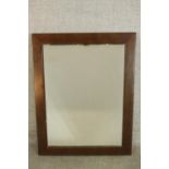 A contemporary mahogany framed rectangular wall mirror. H.93 W.73cm.