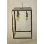 A contemporary brushed brass and glass rectangular hanging lantern. H.43 cm.