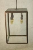 A contemporary brushed brass and glass rectangular hanging lantern. H.43 cm.