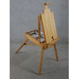 A contemporary beech Dayler Rowney floor standing folding easel raised on splayed supports. H.120