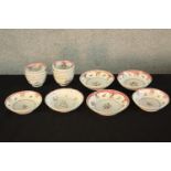 Eight 19th century Chinese export porcelain tea bowls, together with six 19th century Chinese export