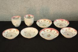Eight 19th century Chinese export porcelain tea bowls, together with six 19th century Chinese export
