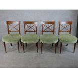 A set of four mahogany Regency 'X' splat back dining chairs with green Dralon stuff over seats