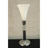 A contemporary chrome table lamp with conical shaped frosted glass light shade. H.58cm.