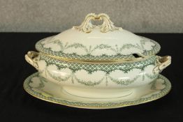 A late 19th century Royal Worcester porcelain lidded tureen and and platter, bearing marks to