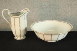 An early 20th century Grimwades Wintonware jug and bowl set. H.14 W.42cm. (largest)