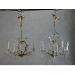 A matched pair of 20th century cut glass six branch hanging electroliers. H.97 W.63 D.63cm