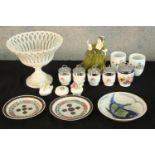 Assorted porcelain to include a Royal Doulton porcelain figure, various Royal Worcester egg coddlers