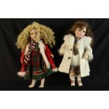 Two contemporary porcelain headed collector's clothed dolls with articulated limbs. H.58cm. (