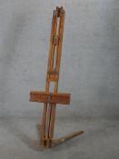 A 20th Windsor & Newton beech floor staning easel with label verso. H.155 W.64 D.60cm
