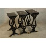 A nest of three early 20th century lacquered intersliding occasional tables with floral