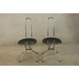 A pair of late 20th century black plexi and chrome framed folding chairs by Niels Gammelgaard for