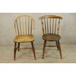 An early 20th century spindle back Windsor style chair raised on turned supports and 'H' stretcher