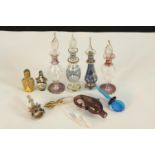 A quantity of vintage glass and gilt decorated miniature perfume bottles and stoppers. H.8cm. (