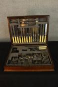 An early 20th century mahogany cased canteen of silver plated cutlery. H.10 W.50 D.38cm. (box)