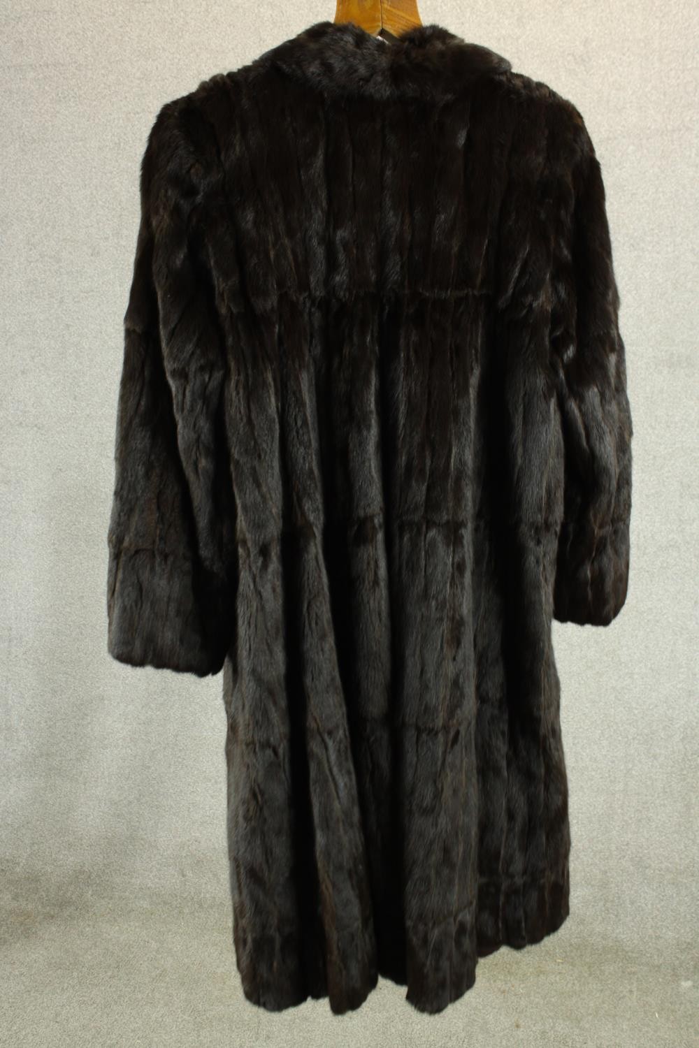 A ladies black fur full length coat. L.80cm. - Image 2 of 2
