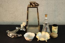 Assorted decorative items to include a glass and brass storm lantern, a chrome plated anchor and