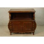A 20th century mahogany French style twin door sideboard raised on turned supports. H.80 W.80 D.