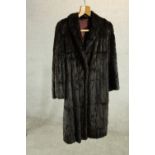 A ladies black fur full length coat. L.80cm.
