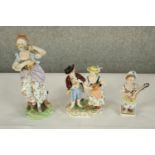 A late 19th/early 20th century painted Dresden porcelain figure of two musicians, painted and