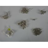 Six bags of white metal (tests as silver) beads, various designs and sizes of beads. H.1 W.1cm