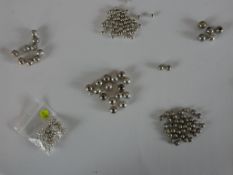 Six bags of white metal (tests as silver) beads, various designs and sizes of beads. H.1 W.1cm