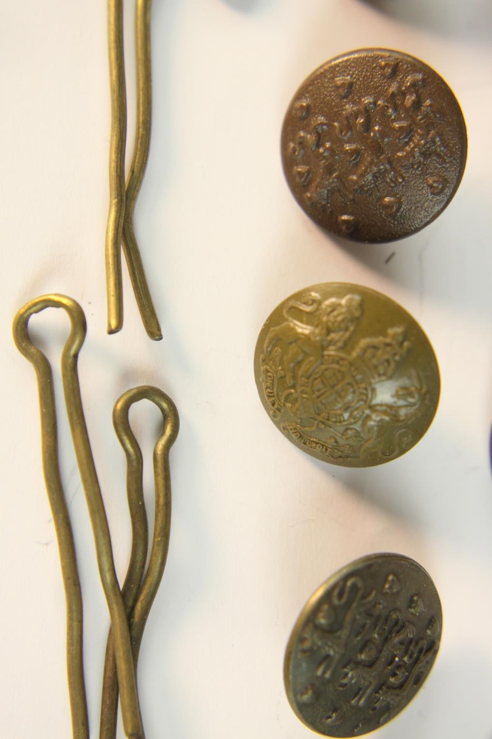 A collection of Danish military badges and uniform buttons, various designs. - Image 8 of 8