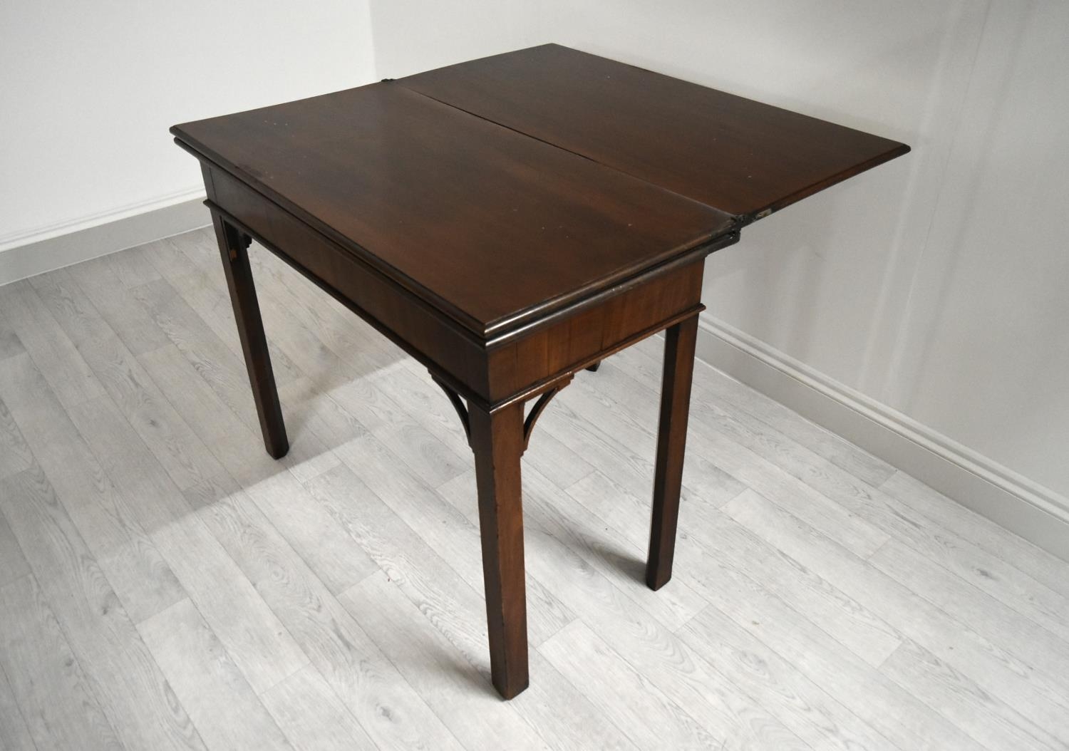 A George III mahogany rectangular fold over table raised on square supports. H.75.5 W.92.5 D.45. - Image 4 of 11