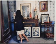 Cecil Jospe (1928 - 2004) Devout Christian lady praying before Christ, colour photograph mounted