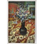 Dorothy Southern. Oil painting on board. A vase of flower on a table cloth. Unsigned. H.39 W.56cm.