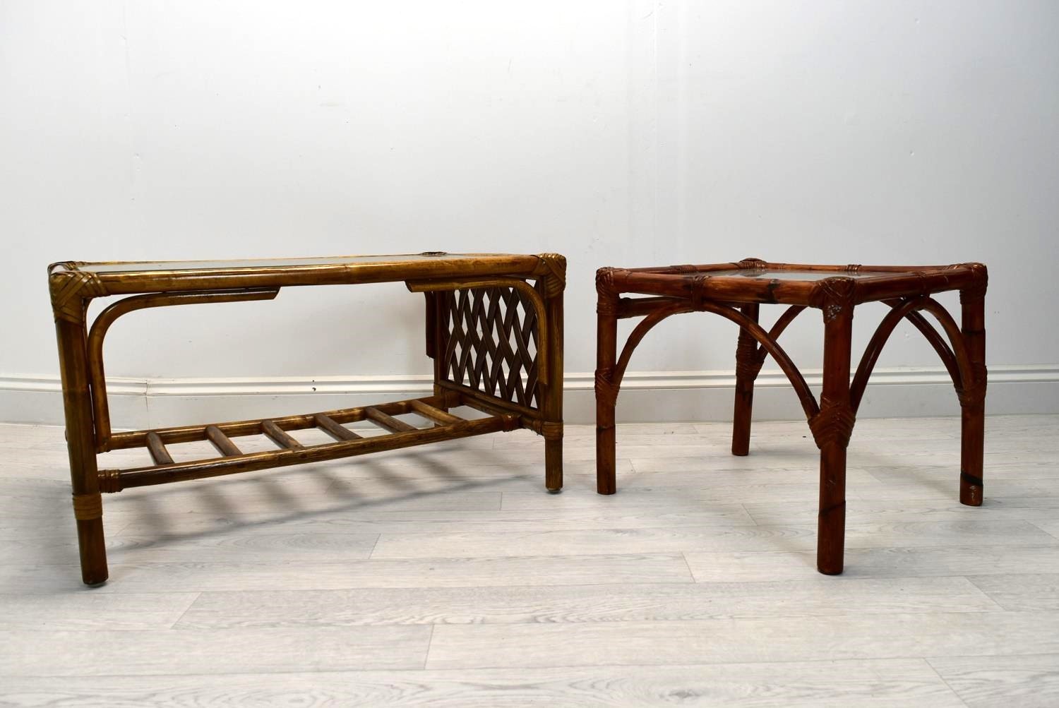 Two cane/bamboo coffee tables with glass tops. H.41 W.76cm (largest)