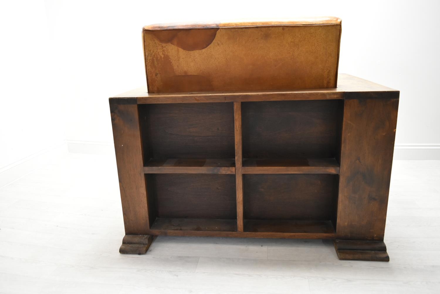 A walnut framed Art Deco leather armchair, the arms and back with integrated shelves. H.86.5 W.111.5 - Image 7 of 7