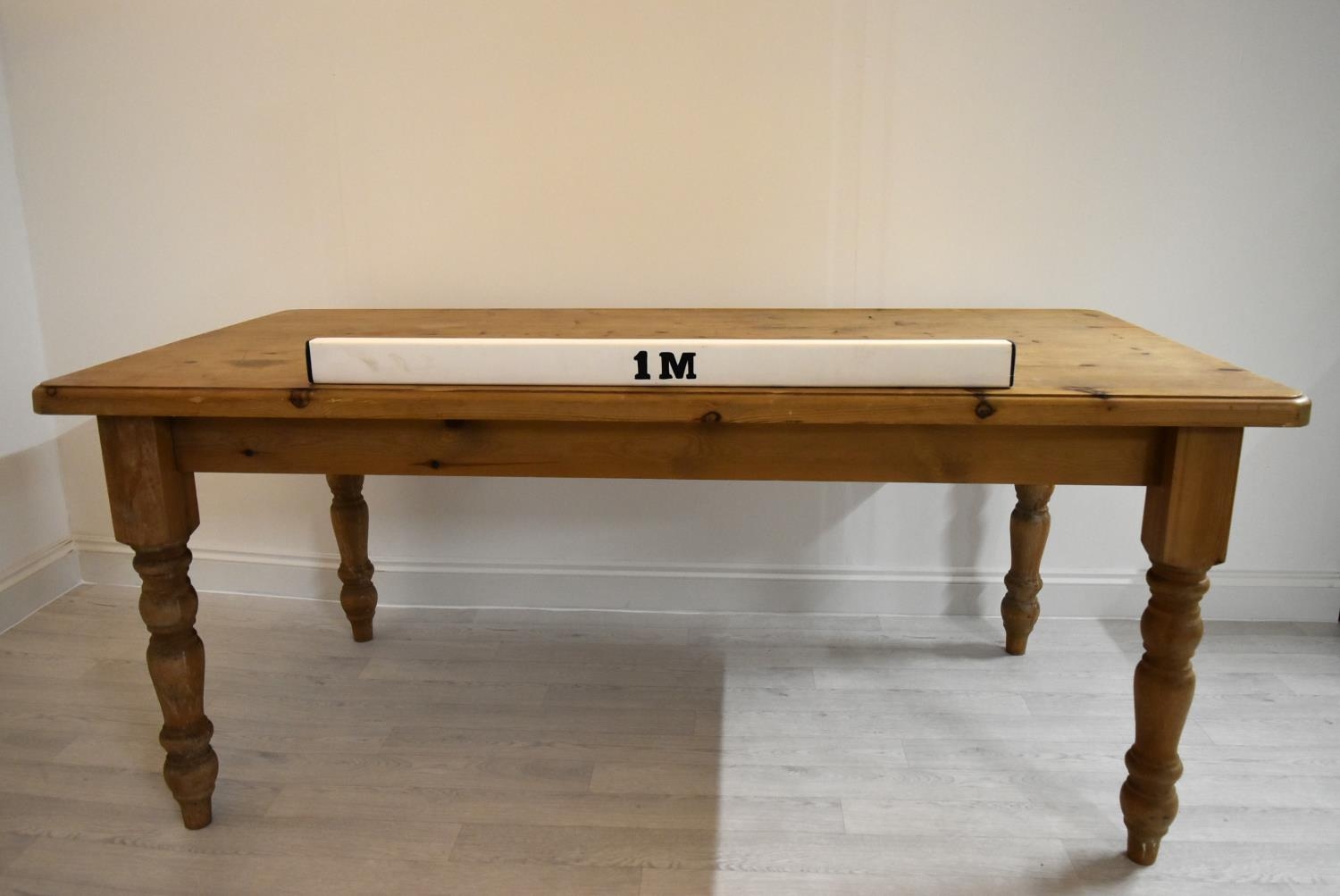 A rectangular pine farmhouse style kitchen table raised on turned supports. H.77 W.183 D.92cm - Image 3 of 6